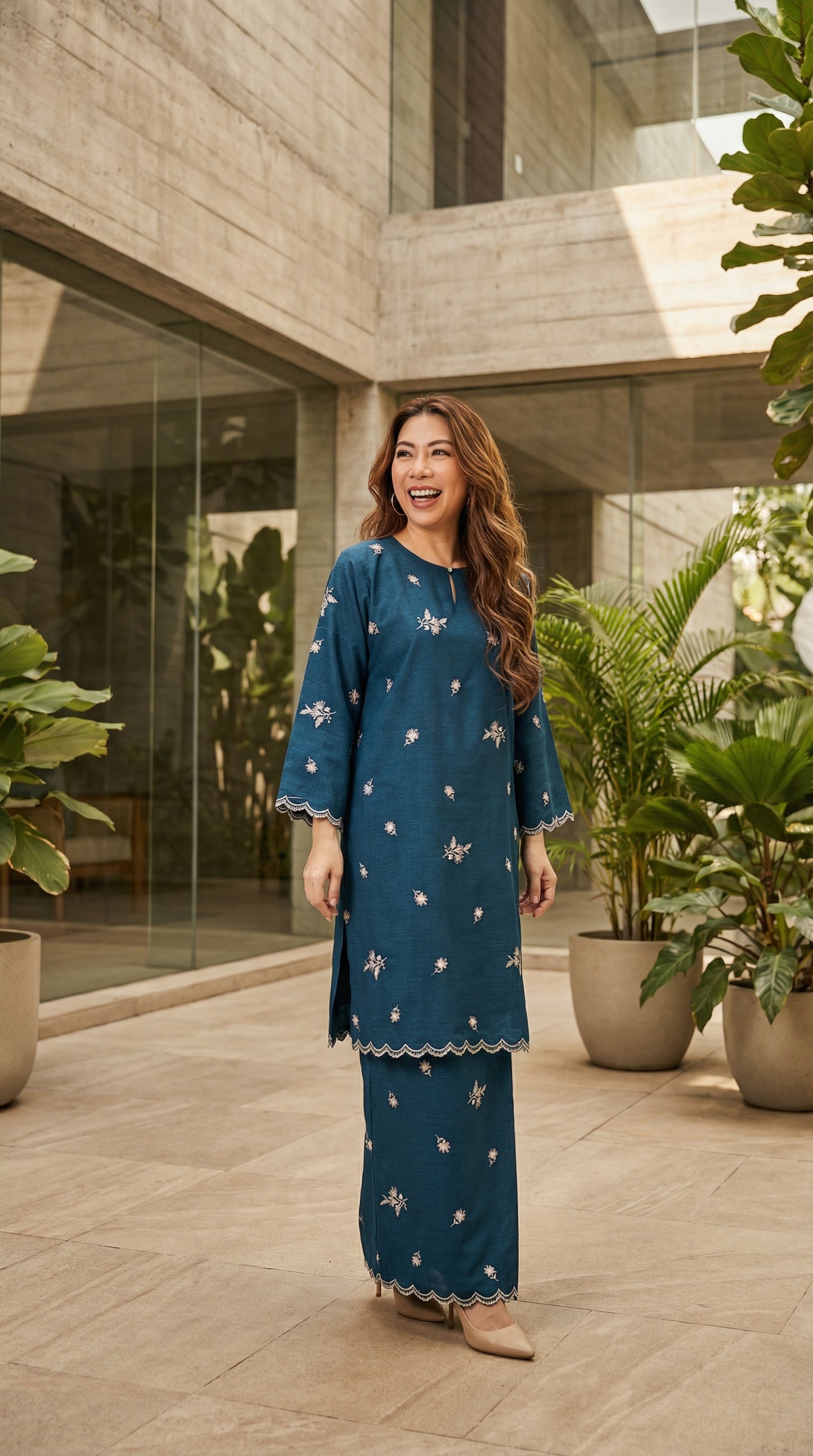 Kurung Della