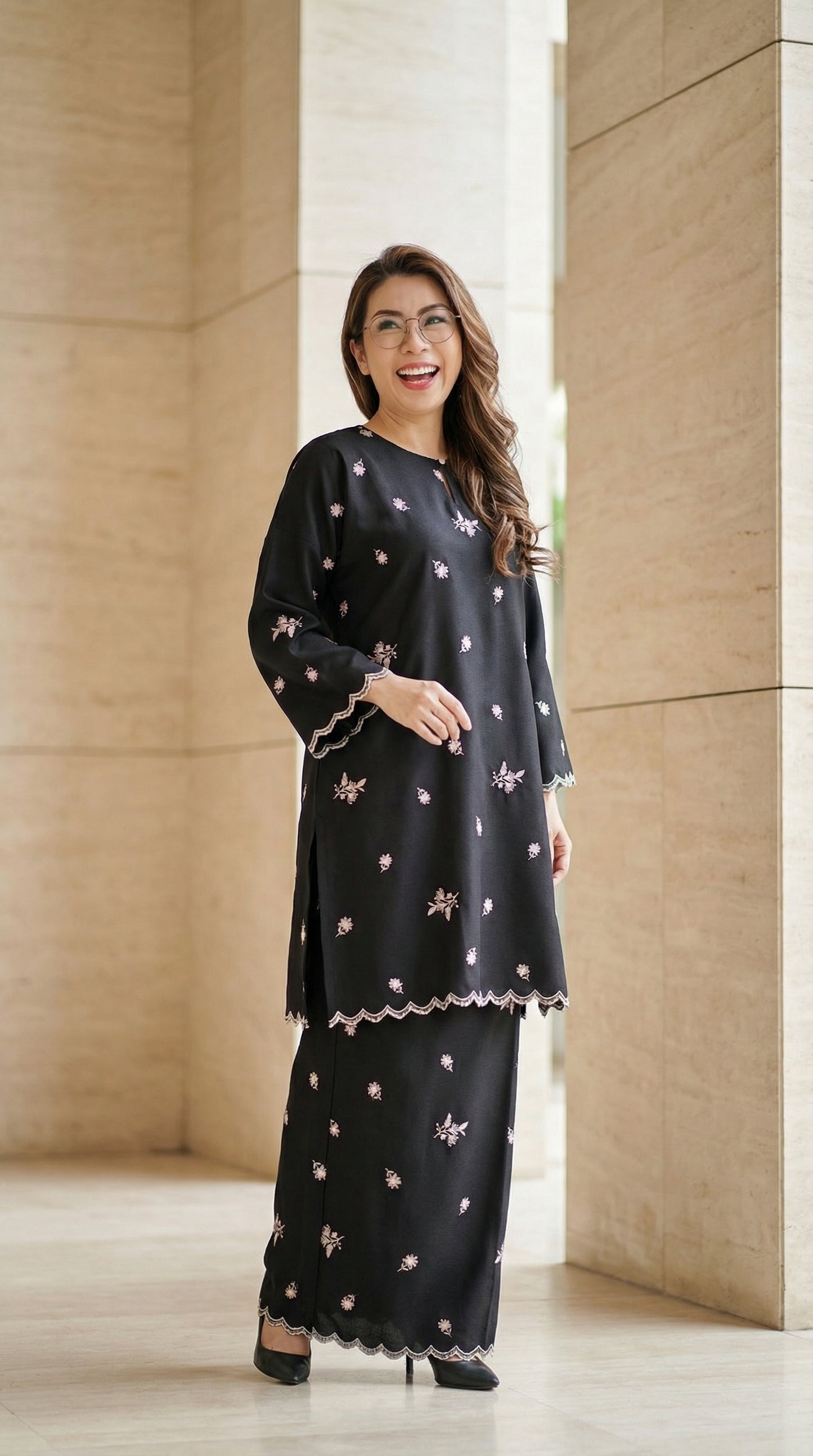 Kurung Della