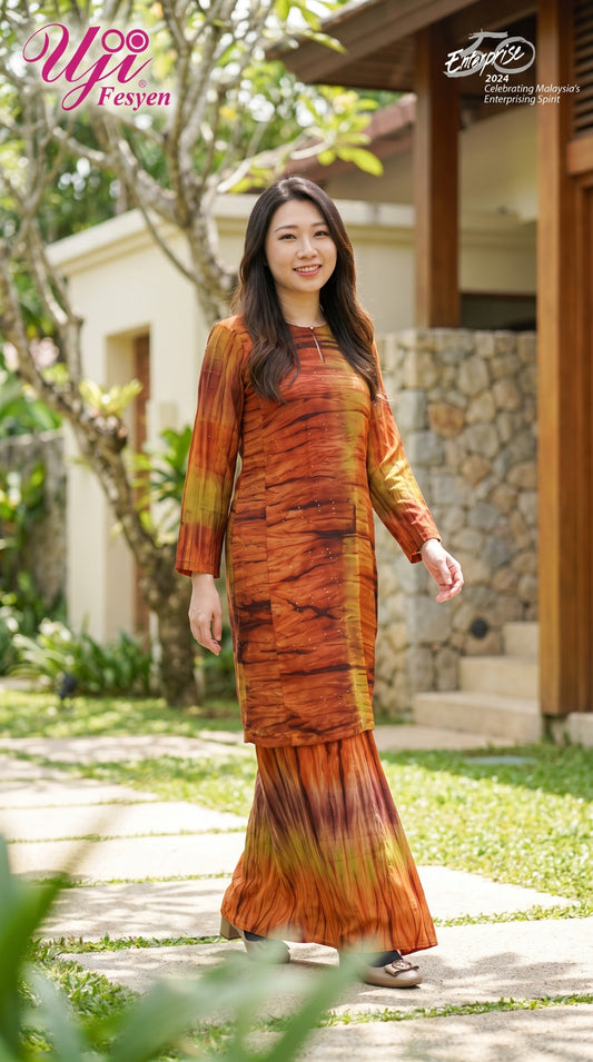 Uji Fesyen Made for You Kurung Pesak in orange fabric - lifestyle front view